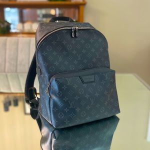 Louis Vuitton backpack with travel cover